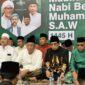 Anggota Komisi IV DPRD Kaltim, Rusman Ya’qub (baju muslim coklat) saat menghadiri acara Maulid Nabi Muhammad SAW dan peringatan Hari Santri Nasional garapan PWNU Kaltim. (Foto: Ist)