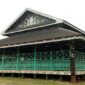 Kondisi rumah lamin adat dayak yang ada di Pulau Kumala. (Foto: Ist)