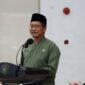 Plt Asisten III Dafip Haryanto membacakan sambutan Bupati Kukar Edi Damansyah dalam kegiatan Forum Konsultasi Publik Standar Pelayanan Bagian Kesejahteraan Rakyat Setkab Kukar di Ruang Serbaguna Kantor Bupati, Tenggarong. (Foto: Ist)