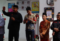 Kepala DPMD Kukar, Arianto saat mendampingi Bupati Edi Damansyah meresmikan Posyandu Bunga Lada. (Foto: Ist)