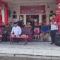 Bupati Kukar, Edi Damansyah saat menghadiri agenda pembagian bantuan pangan di Kecamatan Tenggarong. (Foto: Ist)