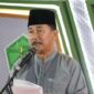 Sekda Kukar saat menghadiri Wisuda Purna Study Ponpes Nurul Islam. (Foto: Ist)