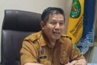 Muhammad Iryanto, Kepala Disdukcapil Kukar. (Foto: Ist)