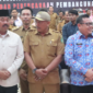 Kepala DPMD Kukar, Arianto bersama Bupati Kukar Edi Damansyah. (Foto: Ist)
