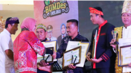 DPMD Kukar Raih Penghargaan di Anugerah Desa Membangun 2024. (Foto: Ist)