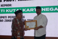 Bupati Kutai Kartanegara (Kukar) Edi Damansyah membuka Kukar Berzakat Tahun 2025. (Foto: Ist)